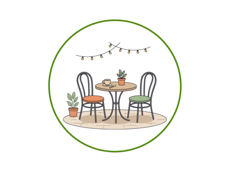 Circular illustration of an outdoor cafe setup: round table with two chairs, string lights above, and potted plants on a beige rug inside a green ring.