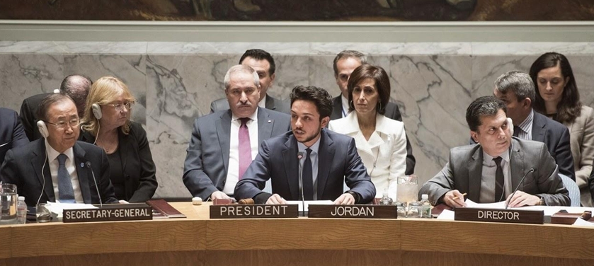 A formal UN-style meeting with officials seated at a long table; nameplates read 'Secretary-General', 'President', 'Jordan', and 'Director' as a central speaker addresses the room.
