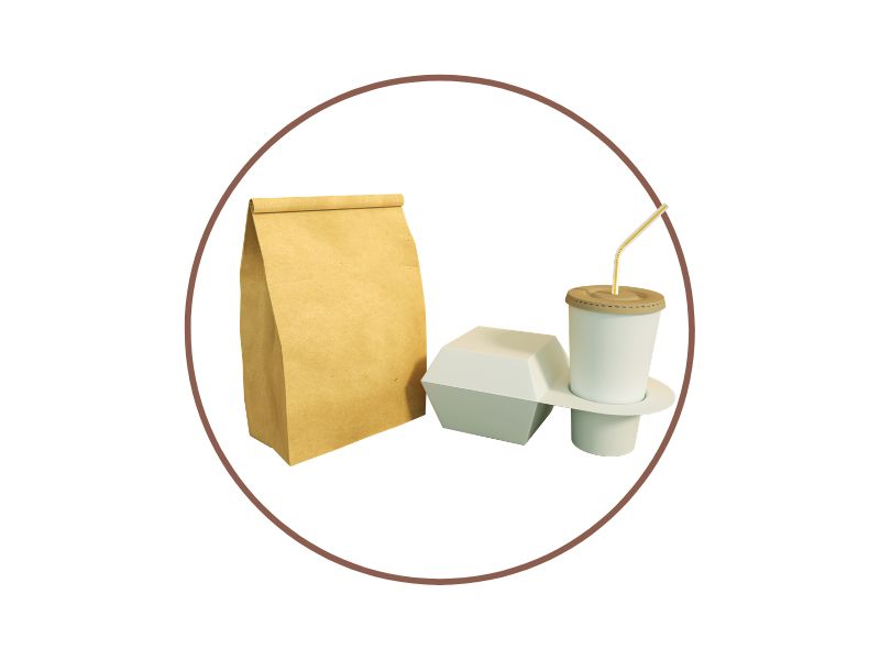 Assorted takeout items: a brown paper bag, a white clamshell box, and a cup with a straw inside a circular frame.