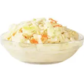 Creamy coleslaw made of shredded cabbage and carrots in a glass bowl on a white background
