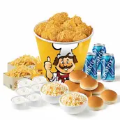 Assorted fast-food feast including fried chicken bucket, buns, macaroni and cheese, biscuits, and blue drink pouches on a white background.